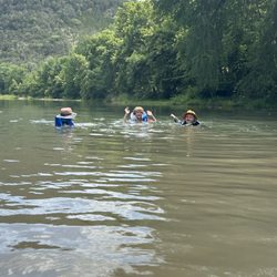 The next generation River Rats swimming in the Guadalupe in July 2024 on a Little Ponderosa 4 hour tubing adventure.