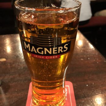 James Joyce - a glass of beer on a coaster - Irish Pub Near Me - Calgary, Alberta