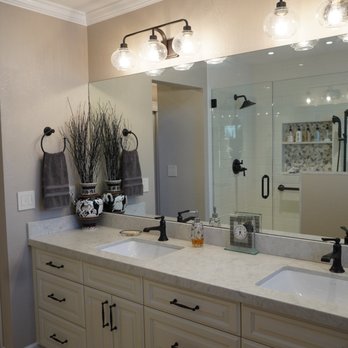 Boone Home Improvement - a bathroom with double sinks - General Contractors Near Me