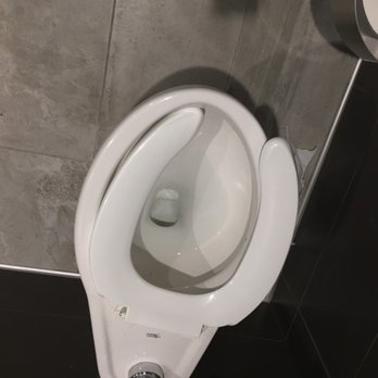 McDonald's - a urinal in a public restroom - Coffee & Tea Near Me - Middletown, Rhode Island