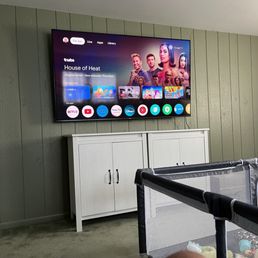 75 inch Hisense wall mounted.