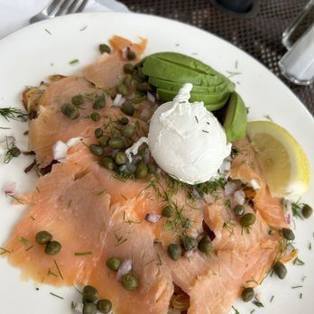 Red House Cafe - Smoked salmon on a potato pancake with a poached egg and avocado - Breakfast & Brunch Near Me - Pacific Grove, California Red House Cafe - Smoked salmon on a potato pancake with a poached egg and avocado - Breakfast & Brunch Near Me - Pacific Grove, California