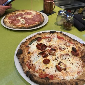 Marco's Coal Fired - Margherita Pizza and a gluten free pizza with Genoa Salami. - Pizza Near Me - Englewood, Colorado Marco's Coal Fired - Margherita Pizza and a gluten free pizza with Genoa Salami. - Pizza Near Me - Englewood, Colorado