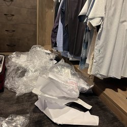 Klass Cleaners - Pile of plastic, paper, rubber bands, and plastic clips.