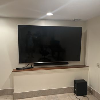 J Greene  - 84 inch TV - Handyman Near Me