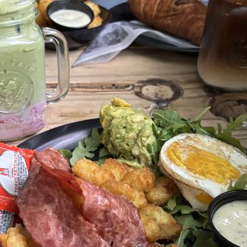 Neverland Coffee Bar - Golden Tater Tots Strawberry Iced Matcha - Coffee & Tea Near Me - North Miami Beach, Florida Neverland Coffee Bar - Golden Tater Tots Strawberry Iced Matcha - Coffee & Tea Near Me - North Miami Beach, Florida