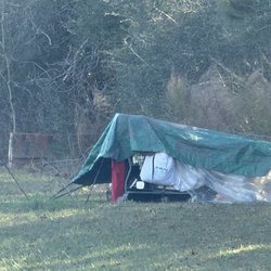 Lake Windcrest Golf Club - Tent camping in the woods adjacent to the fairways along 1488
