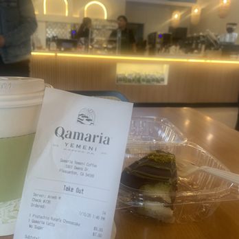 Qamaria Yemeni Coffee - Qamaria Latte (7) Pistachio "Dubai Chocolate" cheesecake (9) - Coffee & Tea Near Me - Pleasanton, California Qamaria Yemeni Coffee - Qamaria Latte (7) Pistachio "Dubai Chocolate" cheesecake (9) - Coffee & Tea Near Me - Pleasanton, California