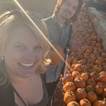 Pumpkin Patch at Webb Ranch - Two friends, a ray of sunshine and orange medium size pumpkins - Pumpkin Patches Near Me - Portola Valley, California Pumpkin Patch at Webb Ranch - Two friends, a ray of sunshine and orange medium size pumpkins - Pumpkin Patches Near Me - Portola Valley, California