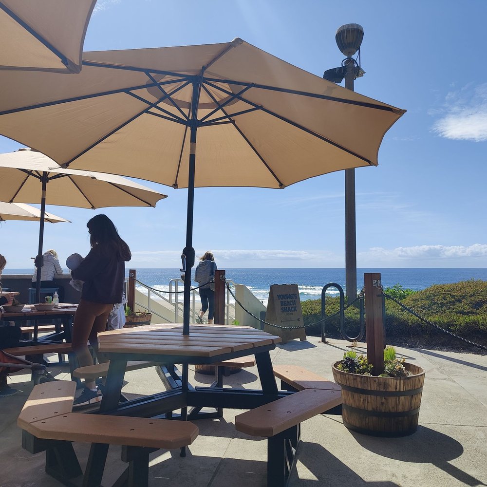 Young's Beach Shack - Seating in front of the building and more tables to the side. - Breakfast & Brunch Near Me - Dana Point, California Young's Beach Shack - Seating in front of the building and more tables to the side. - Breakfast & Brunch Near Me - Dana Point, California