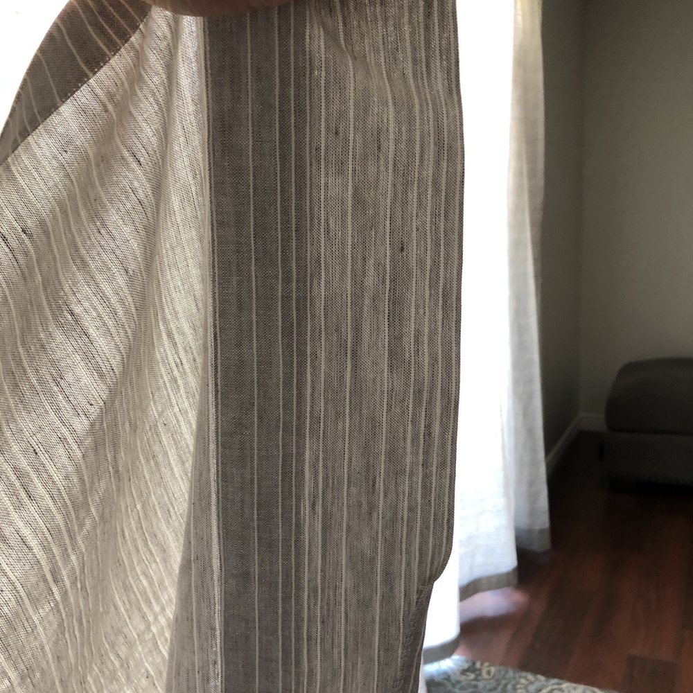 Miryana's Alterations - The right side is the bottom of the panel held up to show how the bottom of the panel is sewn crooked. (Middle, bottom of pic) - Bridal Near Me - Escondido, California Miryana's Alterations - The right side is the bottom of the panel held up to show how the bottom of the panel is sewn crooked. (Middle, bottom of pic) - Bridal Near Me - Escondido, California