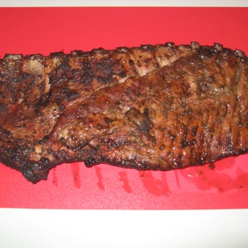 Smokin' Aces BBQ & Catering - Rack of Ribs - Caterers Near Me Smokin' Aces BBQ & Catering - Rack of Ribs - Caterers Near Me