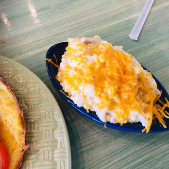 Baked Bistro - Side of grits with cheese - New American Near Me - Hampton, Virginia Baked Bistro - Side of grits with cheese - New American Near Me - Hampton, Virginia