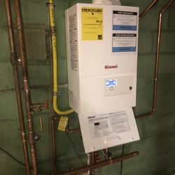 McCann Mechanical Heating Cooling & Plumbing - This is the New "Rinnai" M-Series Combi Wall Boiler. This boiler we installed does Central Hot Water Heat and domestic on demand Hot Water!