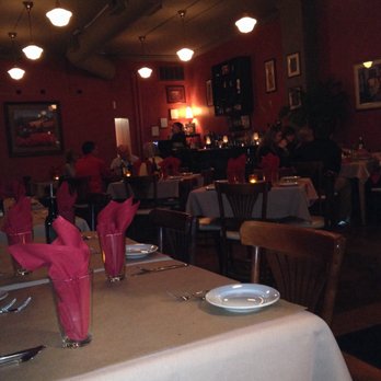 Mangiami Italiano - a dining room with tables and chairs - Italian Near Me - Fort Atkinson, Wisconsin Mangiami Italiano - a dining room with tables and chairs - Italian Near Me - Fort Atkinson, Wisconsin