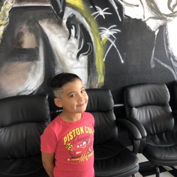Feeling stylish with his new cut. Feeling stylish with his new cut.