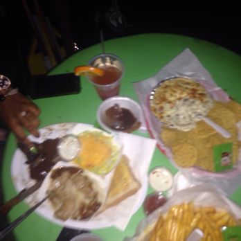 Shamrock - Ribeye steak plate, spinach and artichoke dip and cheese fries - Pubs Near Me - New Orleans, Louisiana Shamrock - Ribeye steak plate, spinach and artichoke dip and cheese fries - Pubs Near Me - New Orleans, Louisiana