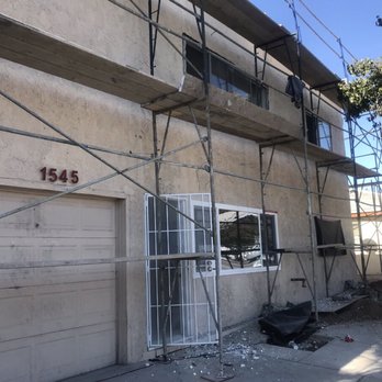 Builder Boy - Reframed the front elevation and added new stucco - General Contractors Near Me - Long Beach, California