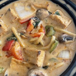 Phuket I'm Vegan - Curry dish with a black hair right on top.