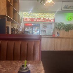 Waiting for my food, nice & clean atmosphere. Didn't see any flies at all here either.