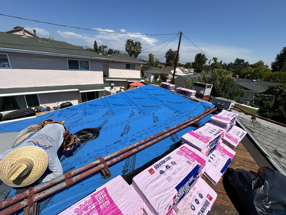 Slide of EZ Roof Repairs