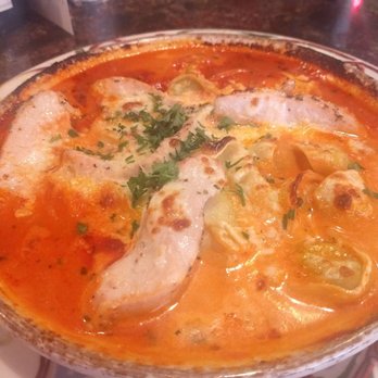 Pasta Jay's - Tortelone with tomato cream sauce and chicken - Italian Near Me - Boulder, Colorado
