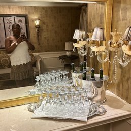 a woman taking a selfie in the mirror