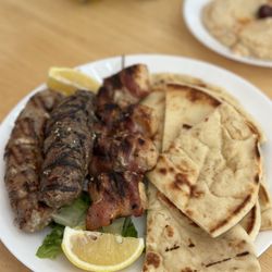 ZGARA Greek Grill - The Mixed Grill for two has a nice sampling of meats and fresh pitas, plus plenty of other toppings