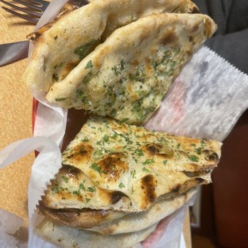 Royal Indian Cuisine - Garlic naan - Indian Near Me - Clarksville, Tennessee Royal Indian Cuisine - Garlic naan - Indian Near Me - Clarksville, Tennessee