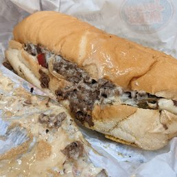 Mike's Famous Philly, regular size. Grilled onions, peppers & white American cheese. Mike's Famous Philly, regular size. Grilled onions, peppers & white American cheese.
