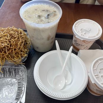 Cafe 48 - Large pork congee with an order of fried noodles. - Hong Kong Style Cafe Near Me - Bayside, New York