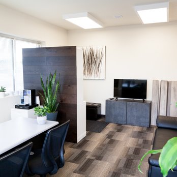 NW Surfaces - a clean office space with large windows - Flooring Near Me - Vancouver, Washington