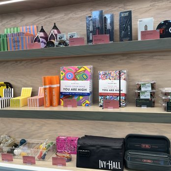 Ivy Hall Dispensary - Wall of merchandise for the reefer lover in your life - Cannabis Dispensaries Near Me - Montgomery, Illinois Ivy Hall Dispensary - Wall of merchandise for the reefer lover in your life - Cannabis Dispensaries Near Me - Montgomery, Illinois
