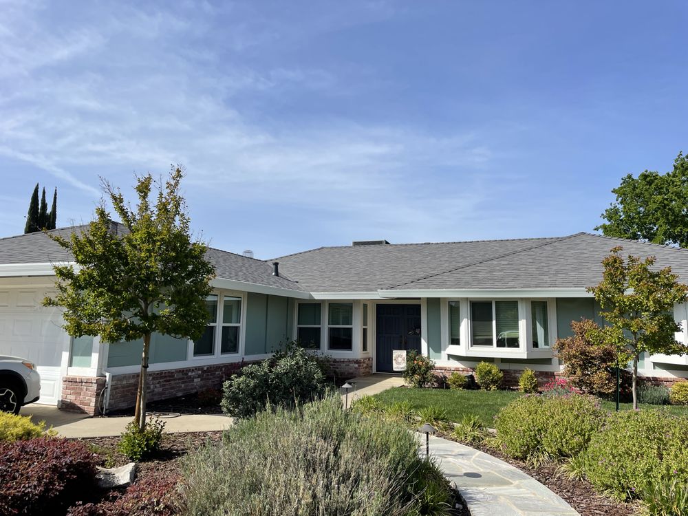 Slide of Triark Roofing