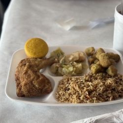 Aunny's - Fried chicken entrée with three sides: dirty rice, fried okra, and cabbage plus it came with the cornbread.