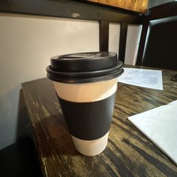 Hot green tea ...or better yet "luke warm" tea