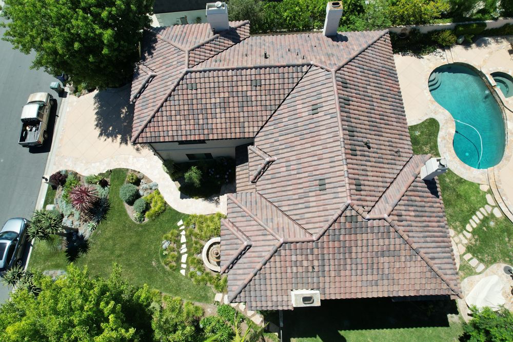 Slide of Enriquez Roofing