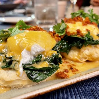 Mediterra Restaurant - Eggs Benedict ($19) buttermilk biscuit, pepper, kale, pork chorizo hollandaise - Italian Near Me - Princeton, New Jersey Mediterra Restaurant - Eggs Benedict ($19) buttermilk biscuit, pepper, kale, pork chorizo hollandaise - Italian Near Me - Princeton, New Jersey