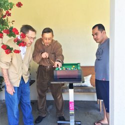 Astoria Retirement Residences - Our gentlemen playing a game of miniature pool.