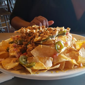 The District Tap - TDT Chicken nachos..good - Sports Bars Near Me - Indianapolis, Indiana