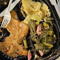 Lola’s Southern Cuisine - Greens smothered cabbage smothered pork chop n gravy, and we got corn bread and drinks