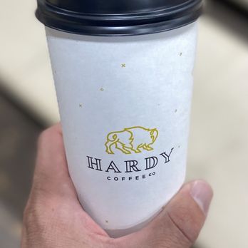Hardy Coffee Co. - a hand holding a cup of coffee - Coffee & Tea Near Me - Omaha, Nebraska