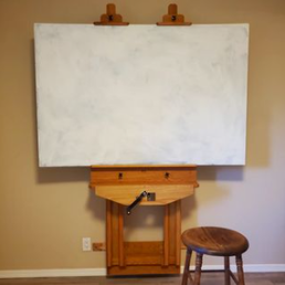 Dylan the Handyman put together and installed my new wall easel