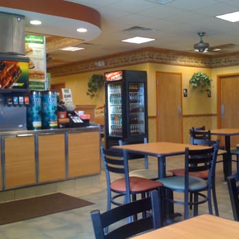 Subway - the inside of a restaurant with tables and chairs - Sandwiches Near Me - Columbus, Ohio