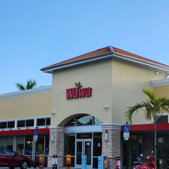 Wawa - the front of a restaurant with cars parked in front of it - Convenience Stores Near Me - Miramar, Florida