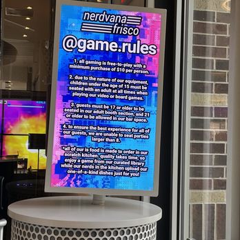 Nerdvana - Sign explaining how things work inside - New American Near Me - Frisco, Texas Nerdvana - Sign explaining how things work inside - New American Near Me - Frisco, Texas