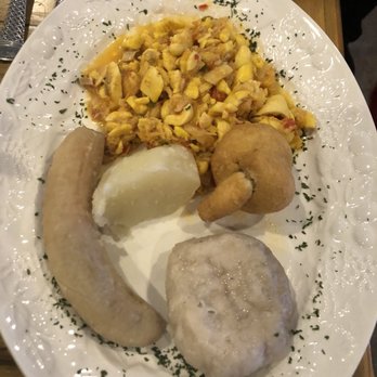 Mad Cow Grill - Ackee and saltfish with boil green banana, boil dumpling, potato, and fried dumpling. - American Near Me - Laurel, Maryland Mad Cow Grill - Ackee and saltfish with boil green banana, boil dumpling, potato, and fried dumpling. - American Near Me - Laurel, Maryland