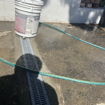 City Plumbing and Rooter - water spilling out of the half section of the trench drain opposite the original drain. - Plumbing Near Me - Winnetka, California City Plumbing and Rooter - water spilling out of the half section of the trench drain opposite the original drain. - Plumbing Near Me - Winnetka, California