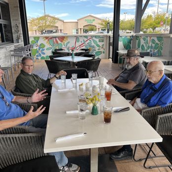 Tula's Kitchen - A group of very happy customers seated outside - New American Near Me - Albuquerque, New Mexico