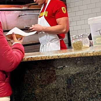 Amore Pizzeria - Rude person on his phone. - Pizza Near Me - Flushing, New York